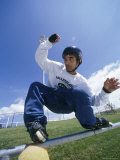 Rollerblader on a Railing