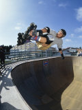 Rollerblader Perfoming Trick on Ramp
