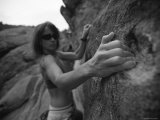Monochromatic Image of Woman Rock Climbing