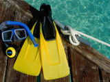 High Angle View of a Mask and Flippers on a Pier