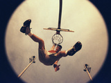 Low Angle View of a Young Male Basketball Player Hanging From The Hoop