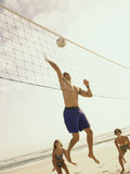 Buy Low Angle View of Three People Playing Volleyball on The Beach at AllPosters.com