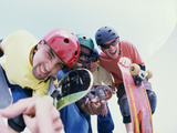 Buy Low Angle View of a Group of Young Men Holding Skateboards at AllPosters.com