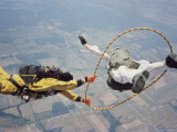 Buy Skydivers Perfoming Stunt at AllPosters.com