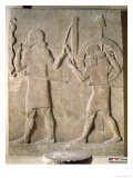 Two Soldiers Carrying the King's War Chariot, from the Palace of Sargon II, Khorsabad, Iraq
