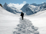 Buy A Lone Mountain Hiker Walks in the Snow, Formazza Valley, Northern Italy at AllPosters.com