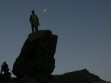 Buy An Afghan Man Stands on a Huge Rock Next to the Now Abad Dinazung Monument at AllPosters.com