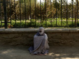 Buy An Afghan Beggar Woman Clad in Burqa Waits to Receive Money in Kabul, Afghanistan, August 3, 2006 at AllPosters.com