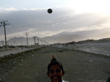 Buy Afghan Boys Play with a Ball in Kabul, Afghanistan, Friday, July 7, 2006 at AllPosters.com