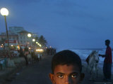 Buy A Sri Lankan Boy Looks as He Sells Prawns at the Sea Front, in Colombo, Sri Lanka, June 30, 2006 at AllPosters.com
