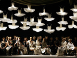 Models Sit on the Stage at the End of the Antonio Marras Fashion Collection