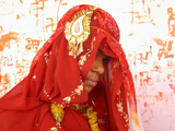 Fifteen-Year-Old Girl Poses for a Photograph after Her Marriage