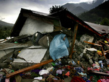 A Pakistani Earthquake Survivor Takes Shelter from the Rain