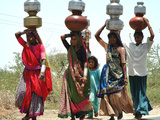 Women Carry Water at Lat Village