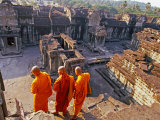 Buy Monks Overlook Angkor Wat, Cambodia at AllPosters.com