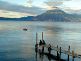 Buy Sunrise over Lake Atitlan and Women on End of the Pier, Solola, Guatemala at AllPosters.com