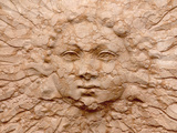 Buy Close-up of a Carved Sun Face on a Cracked Stone Wall at AllPosters.com