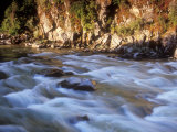 Buy The Payette River Flows by with Lit Rock Wall Behind, Idaho, USA at AllPosters.com