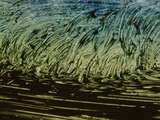 Close-up of Dark Blue and Green Paint Smeared into a Rough Texture
