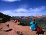 Buy A Hiker Taking in the Views of Red Rock Wilderness in Sedona, Sedona, Arizona, USA at AllPosters.com
