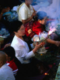 Buy Local People Presenting Alms to the Monks at Pha That Luang Temple- Vientiane, Laos at AllPosters.com