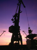 Buy Cranes in Port Silhouetted at Dusk, Assab, Eritrea at AllPosters.com
