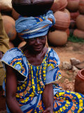 Buy Woman with Pot Balanced on Head, Looking at Camera, Yamoussoukro, Cote d'Ivoire at AllPosters.com