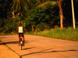 Boy Riding Bike on Dirt Road, Ko Samui, Surat Thani, Thailand