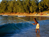 Boy Fishing off Beach, Tofo, Mozambique