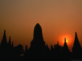 Buy Wat Chaiwattanaram Silhouetted at Sunset, Ayuthaya Historical Park, Thailand at AllPosters.com