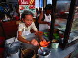 Woman Cooking in Street Stall, Mersing, Malaysia