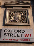 Coat of Arms and Street Sign on Wall, Oxford St, London, United Kingdom