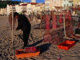 Buy Man on Beach Making Fishing Nets, Nazare, Portugal at AllPosters.com