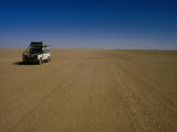 Buy Car Crossing Sahara Desert, Algeria at AllPosters.com