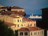 Buy Elba Ferry Passing Old Section of Town, Piombino, Italy at AllPosters.com