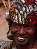 Buy Close Up of a Traditionally Attired Woman in Colourful Headwear Near the Niger River, Mali at AllPosters.com