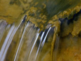 Water Pouring off Mineral Deposits from Thermal Springs, Yellowstone National Park, Wyoming, USA