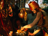 Buy Sadhu Making Puja at Maha Devi Shrine Brings Offerings During Kumbh Mela, Haridwar, India at AllPosters.com
