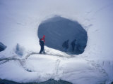 Hikers Shelter in a Warm Ice Cave During a Blizzard on the Kverkfjoll Rout, Iceland