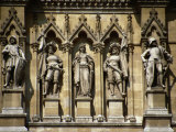 Figures Sculpted in Stone Below the Clock-Tower, Rathaus (1872-73), Vienna, Austria