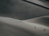 Hikers Traverse One of the Huge Sand Dunes in the San Luis Valley Near Alamosa, Colorado, USA