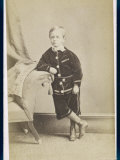 Boy Wears a Velvet Suit of Danish Trousers and Collarless Jacket with a Belt of the Same Material