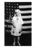 Little Girl in Nurses Outfit Holding US Flag
