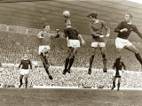 Manchester United vs. Arsenal, Football Match at Old Trafford, October 1967 Photographic Print