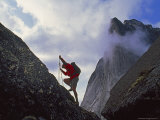 Climber Scales a Boulder Below Mount Harrison Smith