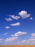 Cumulus Clouds Above a Wyoming Prairie in Late Summer Photographic Print