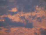 Mt. McKinley Seen Through a Veil of Cumulus Clouds in Morning Light Photographic Print