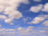 Cumulus Clouds Above the Masai Mara National Reserve Photographic Print