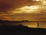 Buy Silhouette of a Woman Walking Along the Harbor at AllPosters.com