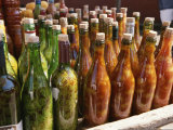 Buy Close View of a Colorful Group of Bottles Containing Foodstuffs at AllPosters.com